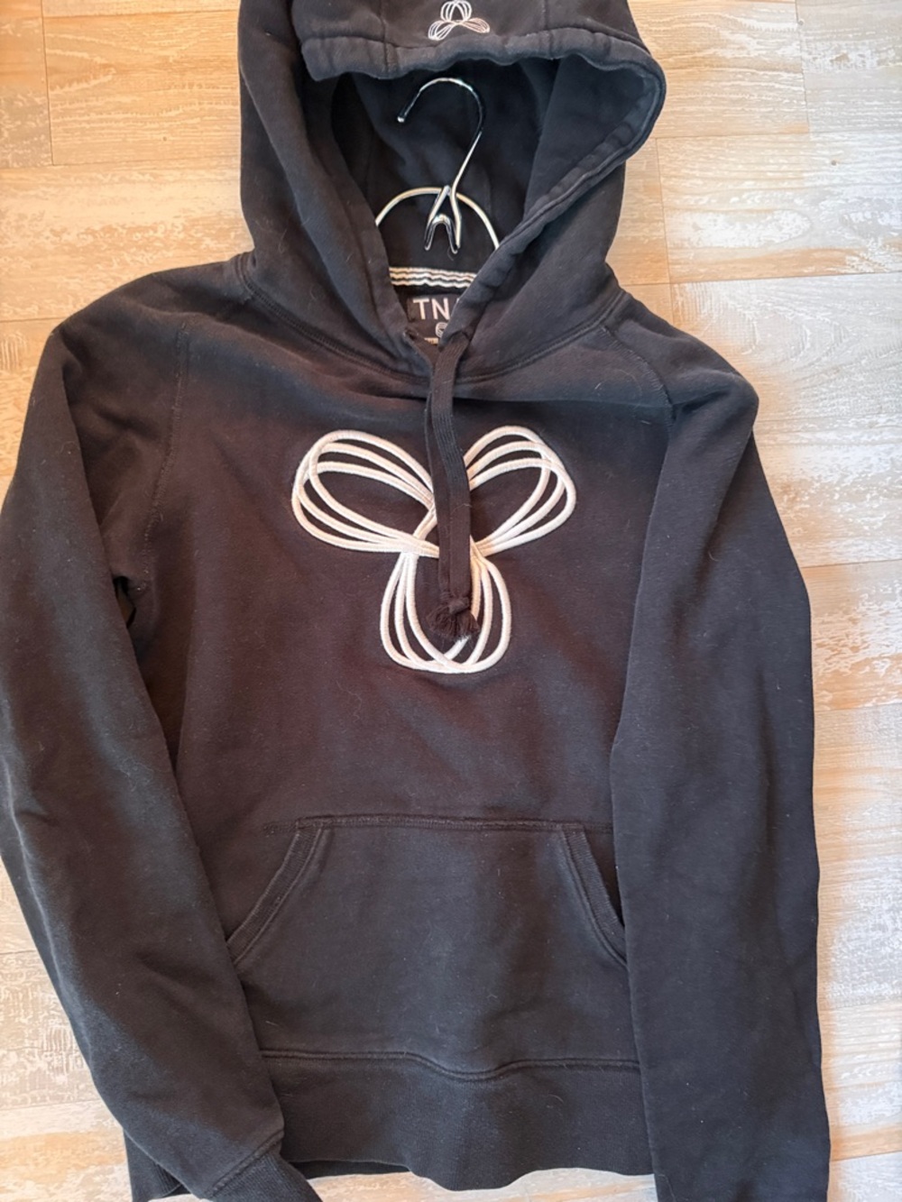 TNA Black Hoodie with White Trim and Logo